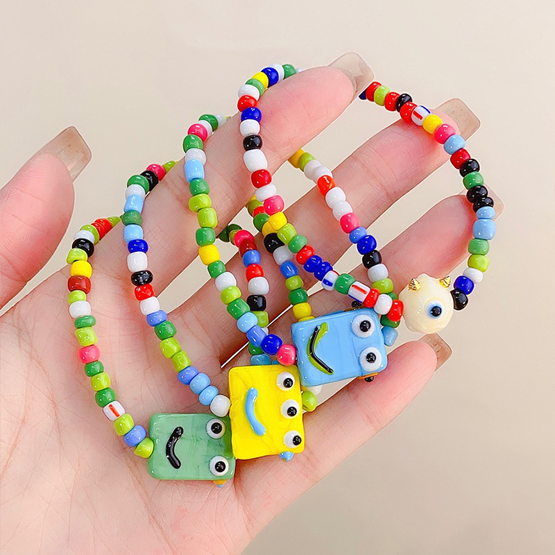 卡通小怪兽手链彩色串珠陶瓷手串女学生闺蜜礼物小众设计网红饰品