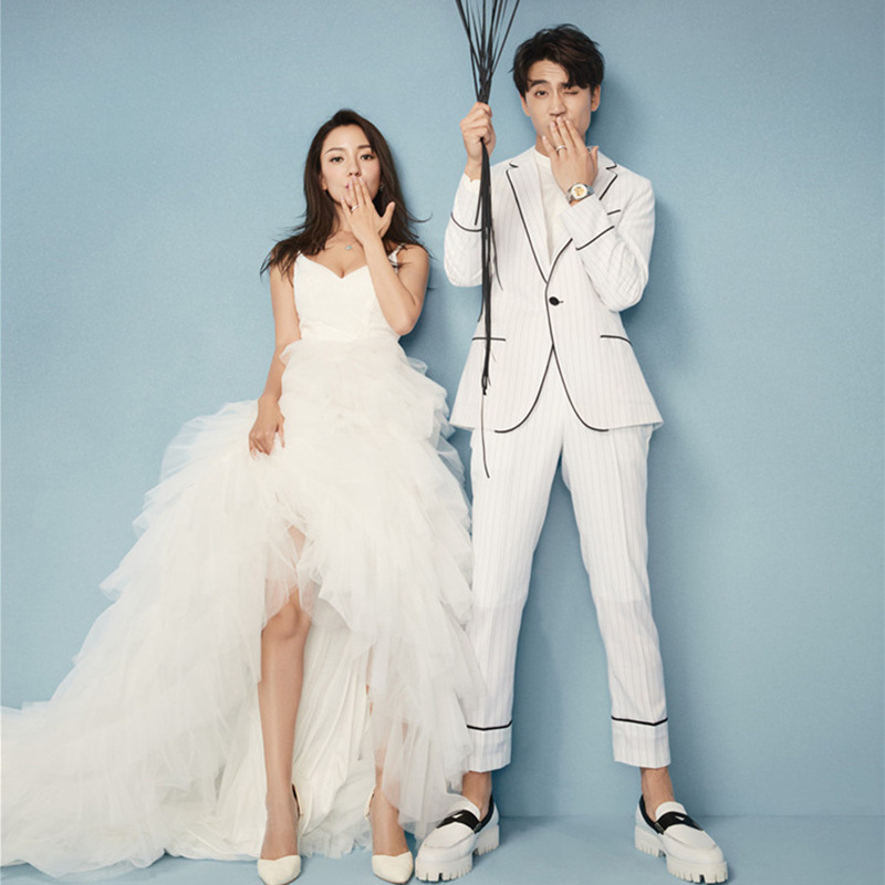 新款外景街拍影楼主题服装蛋糕长裙轻纱情侣拍照礼服摄影写真婚纱