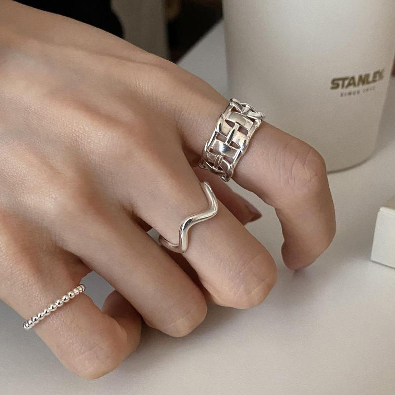 south korea 925 silver light luxury minority ins style design weaving hollow open ring female fashion personalized index finger ring