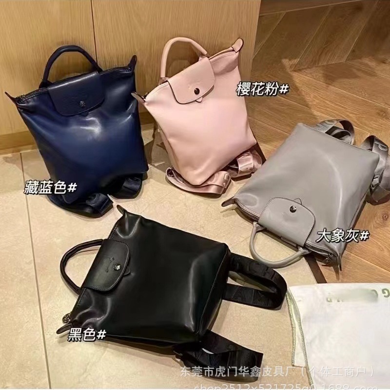 龙骧包2024新款小牛皮双肩包男女通用时尚休闲双肩包大容量背包