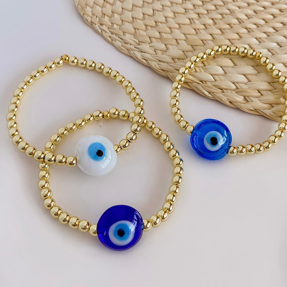 亚马逊欧美流行个性恶魔之眼琉璃扁珠手串18k铜镀金珠弹力手链女