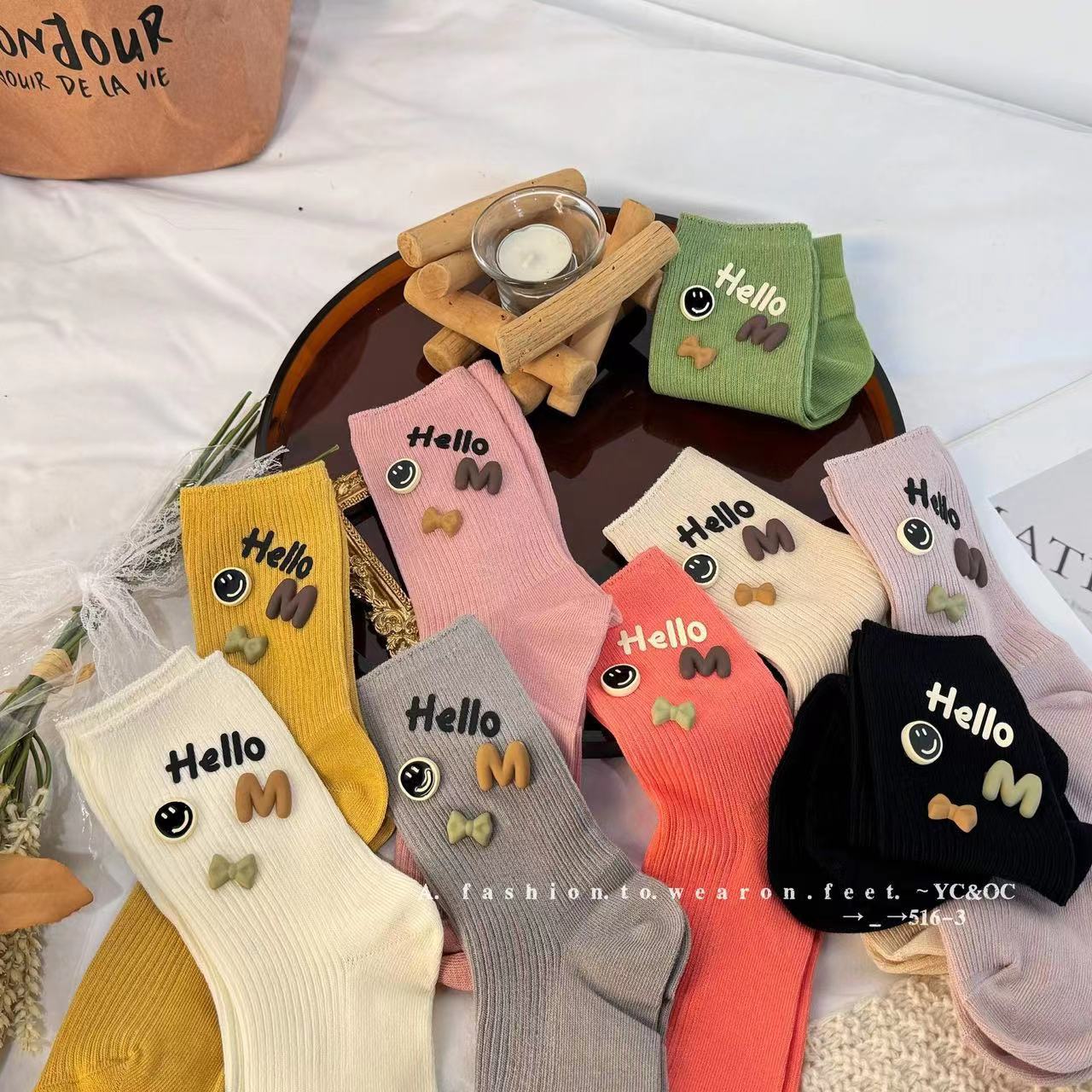 24新款袜子女多巴胺饰品笑脸袜子表情蝴蝶结字母中筒袜甜美风潮袜