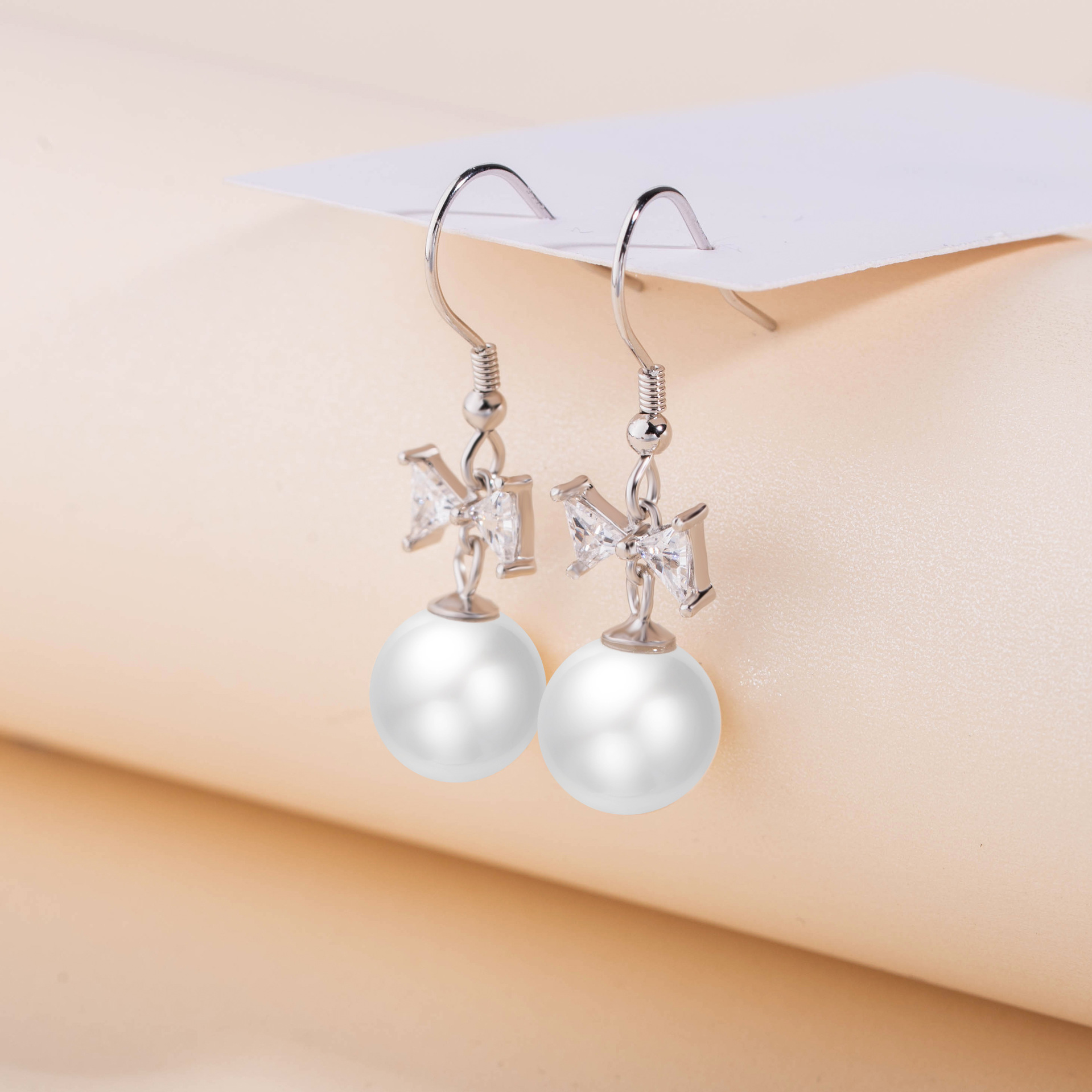 新款925银针韩国气质镶钻蝴蝶结耳钉圆脸显瘦时尚珍珠耳环复古耳饰