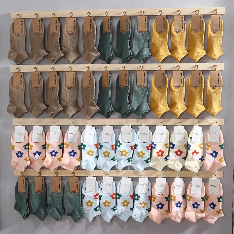 木质袜子陈列展示架挂袜子的墙上货架墙面童装店铺饰品摆放收纳架