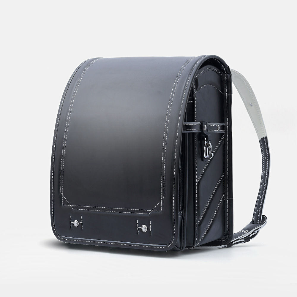 日式新款小学生儿童书包1-3-5年级中性男女孩开学pu皮双肩包批发