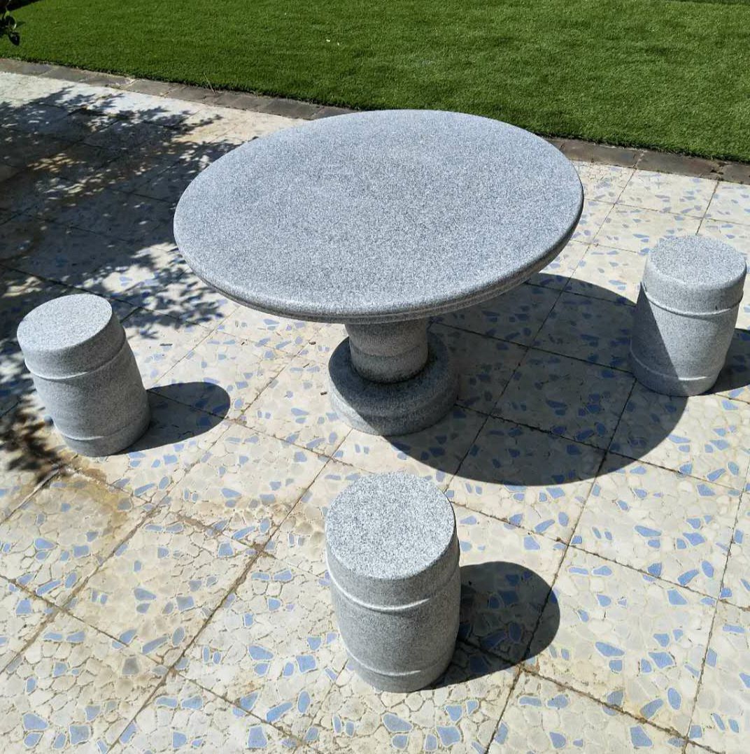 厂家直销批发供应石桌石凳公园石雕桌凳定做多种石雕圆凳圆桌凳