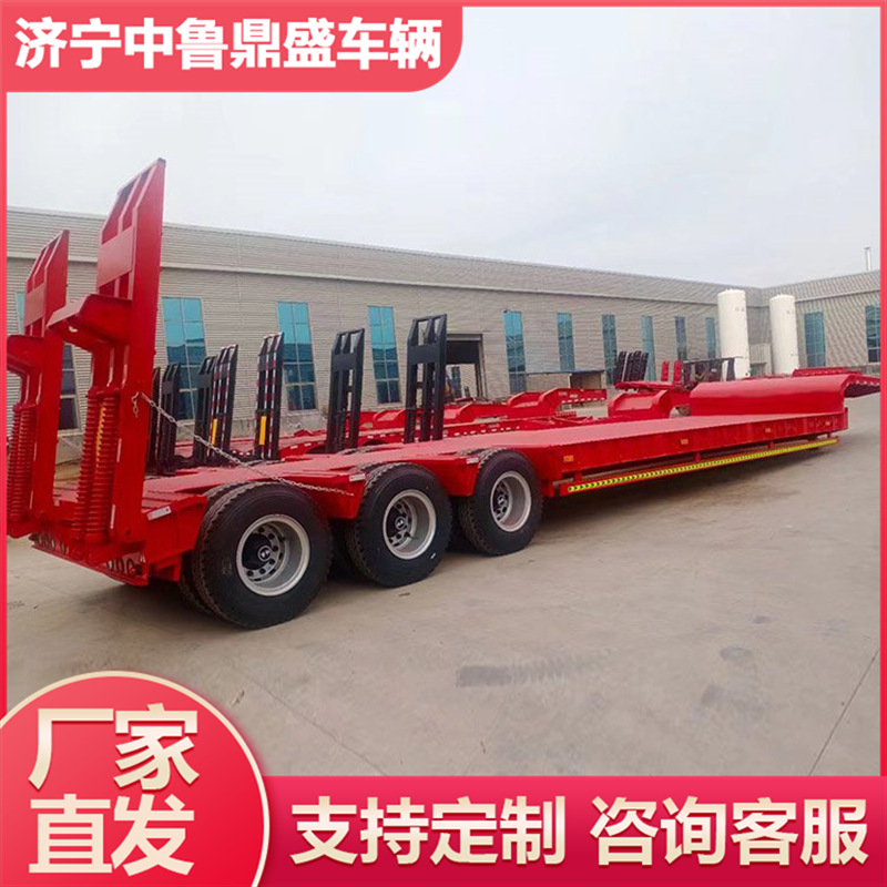 四线八轴地平板半挂车 单节液压爬梯勾机板半挂车 自卸半挂车