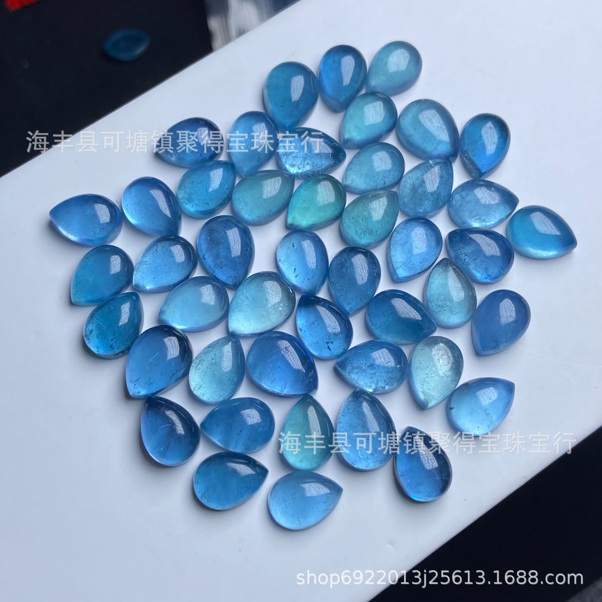 可塘工厂批发海蓝宝水滴裸石深海蓝魔鬼蓝海蓝宝石带星光荧光裸石