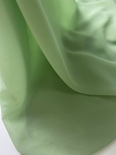 牛油果绿100D雪纺布料面料婚庆布置纱幔婚纱礼服草绿色网纱布料