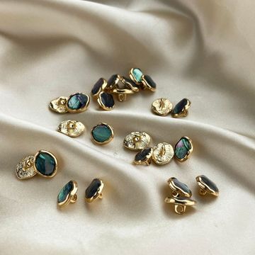 现货高档金属钮扣黑蝶贝滴胶扣贝壳扣毛衣开衫装饰扣毛呢扣子椭圆