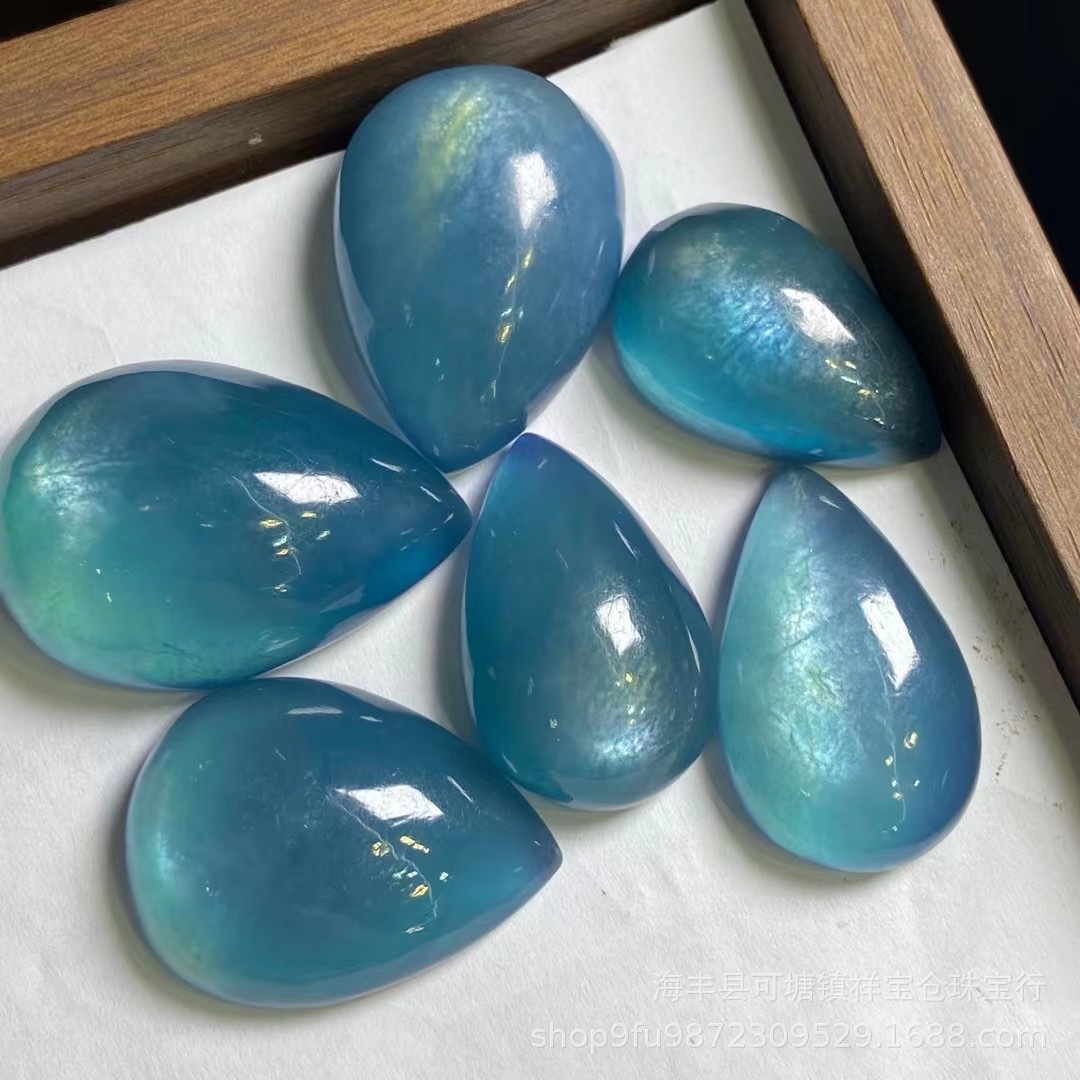 天然魔鬼蓝海蓝宝水滴吊坠裸石 蓝荧光晶体透海蓝宝爆闪猫眼吊坠