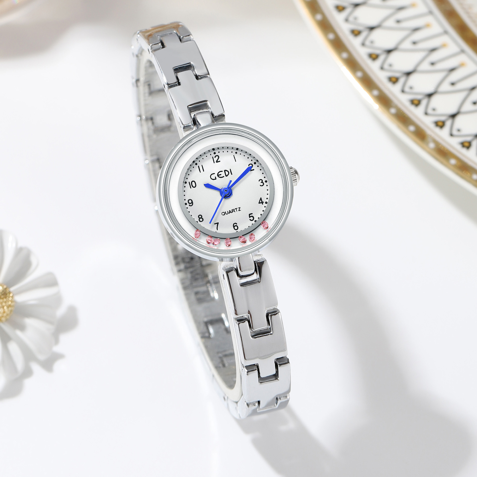 gedi歌迪品牌圆表盘时尚流沙防水石英腕表轻奢风休闲气