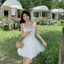 白色吊带连衣裙2023女新款网纱蓬蓬仙女高级感长裙子