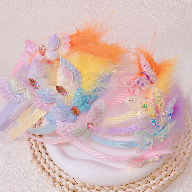 义乌地摊文具店头饰2元店批发网红女秋冬羽毛翅膀发箍头箍头扣g59