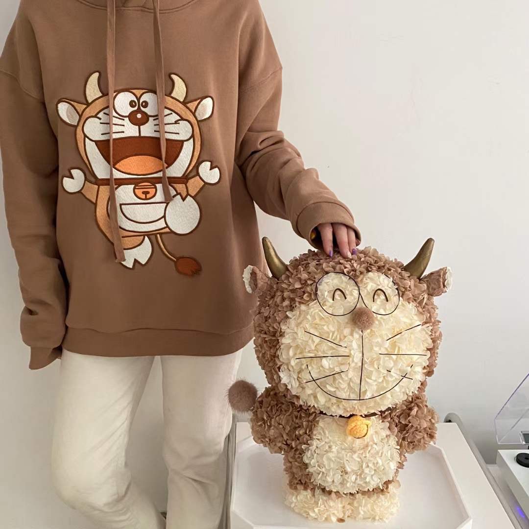 厂家永生花设计玩偶机器猫联名系列大小号牛角多啦咧嘴多啦