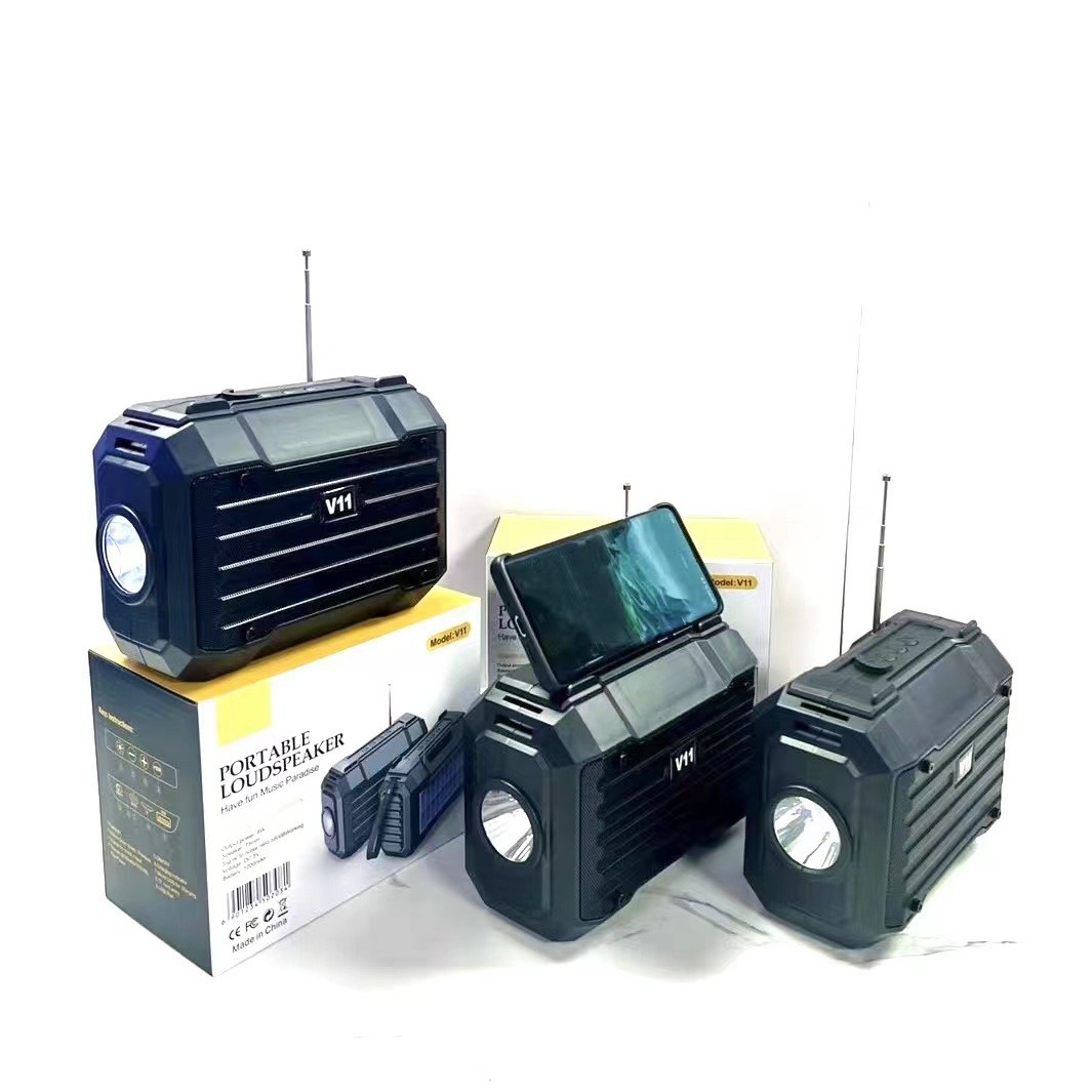 非洲新款v11蓝牙音箱 插卡天线收音机手提户外大手电筒太阳能音响