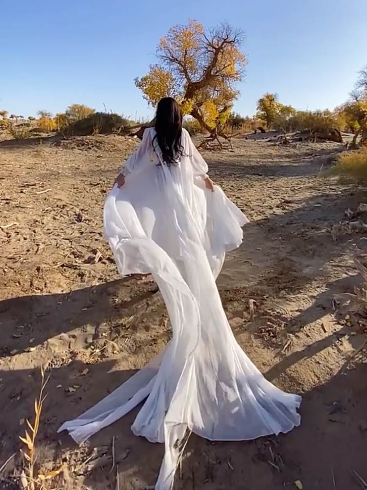 白色沙滩裙女云南三亚旅游沙漠长裙海边度假仙女裙拖尾拖地连衣裙