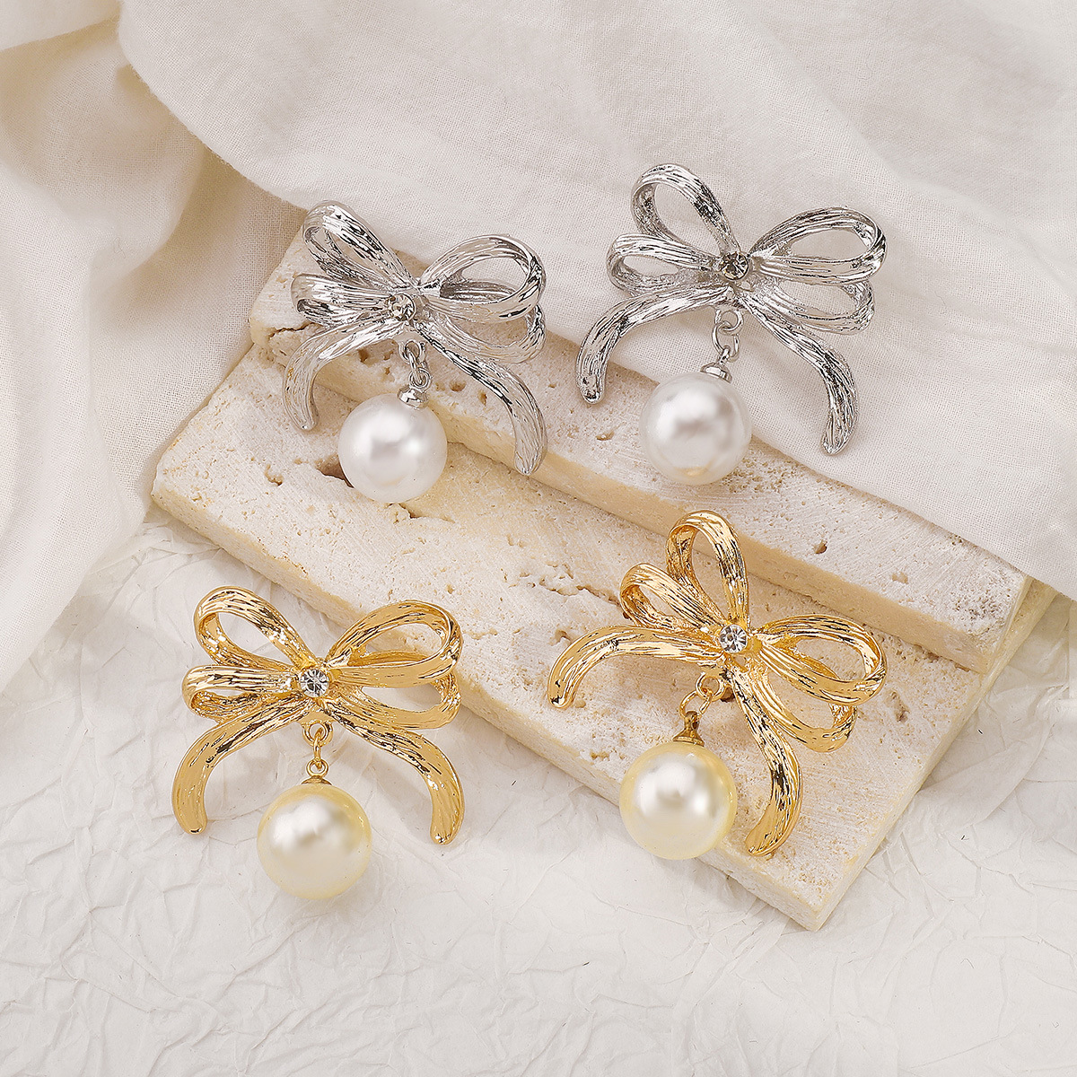 e12704跨境设计感bowearings蝴蝶结珍珠耳钉 甜美风简约小众耳环