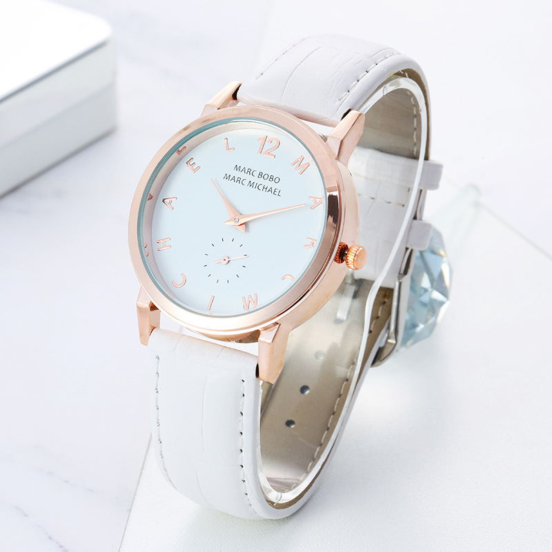 时尚女士白色表盘数字字母刻度假眼休闲学生腕表简约皮带气质女表
