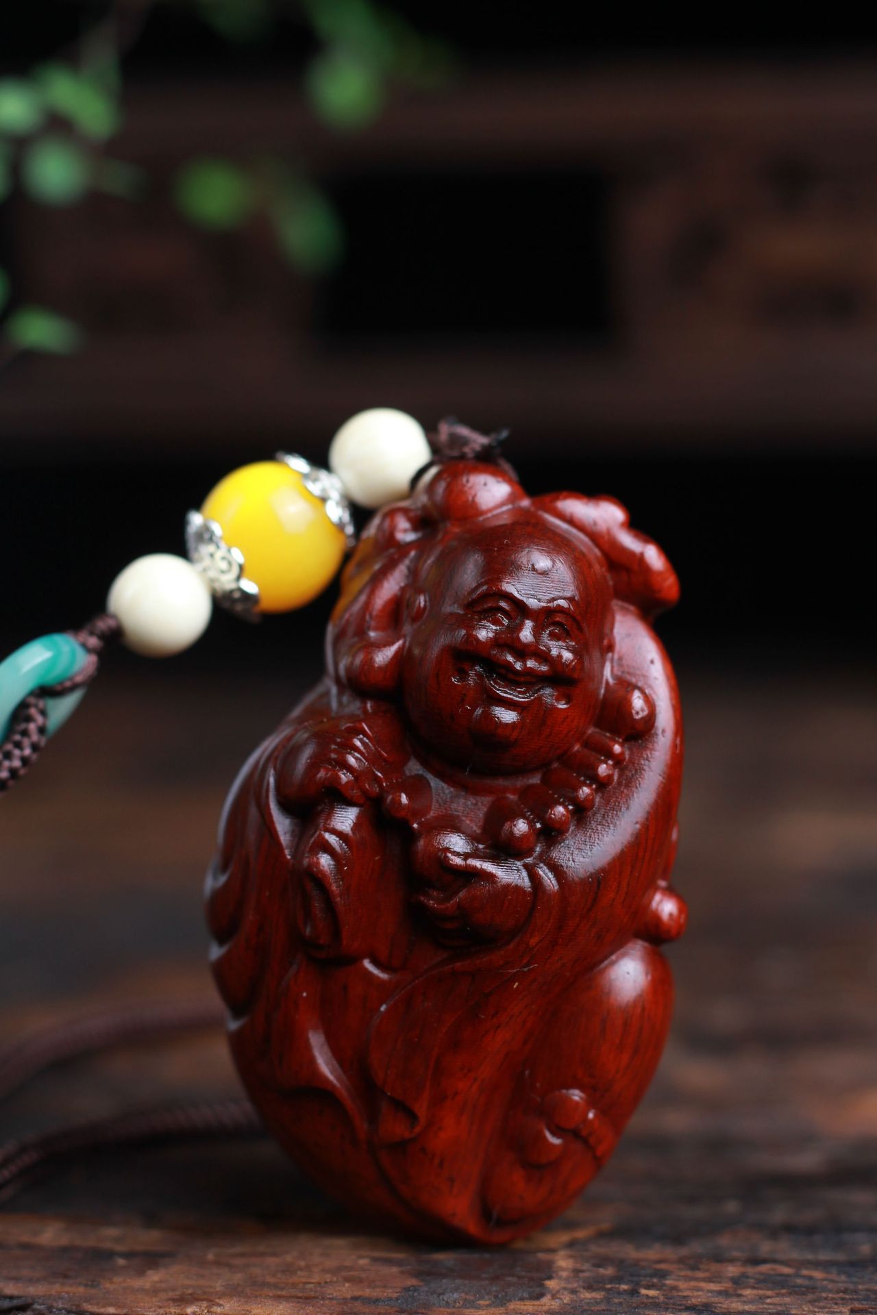 弥勒福木雕小叶紫檀布袋弥勒佛手把件 木质工艺品文玩把件批发