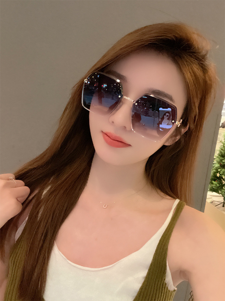 2023年新款潮防紫外线渐变太阳眼镜女士夏无框墨镜感近视-阿里巴巴