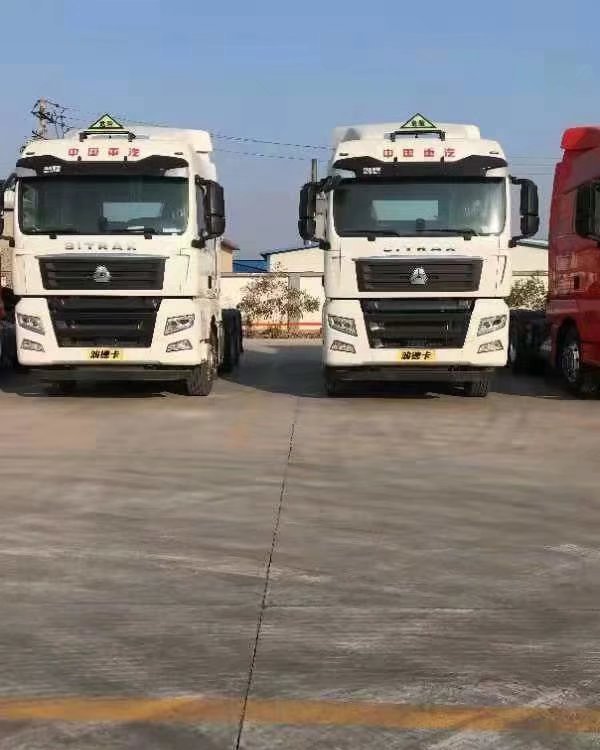 中国重汽汕德卡危险品牵引车460马力红色白色-阿里巴巴