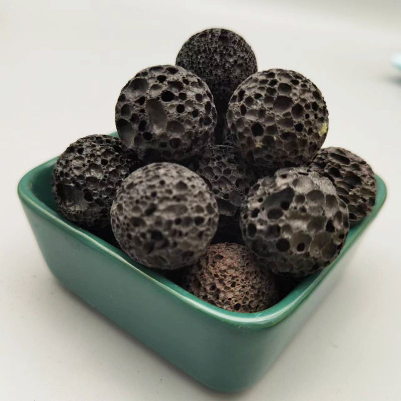 厂家供应火山石球 污水处理铺面 高吸附红色黑色多孔磨圆火山石岩