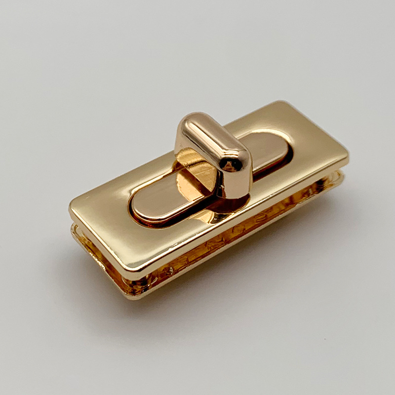 厂家供应锌合金锁扣手袋装饰锁扣 箱包五金旋转开关 拧锁扣配件