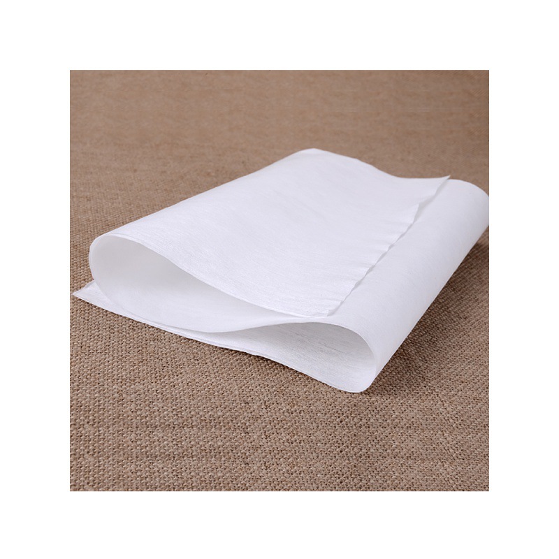 一次性毛巾足浴无纺布擦脚纸木浆洗脚吸水毛巾酒店理发美容足浴巾