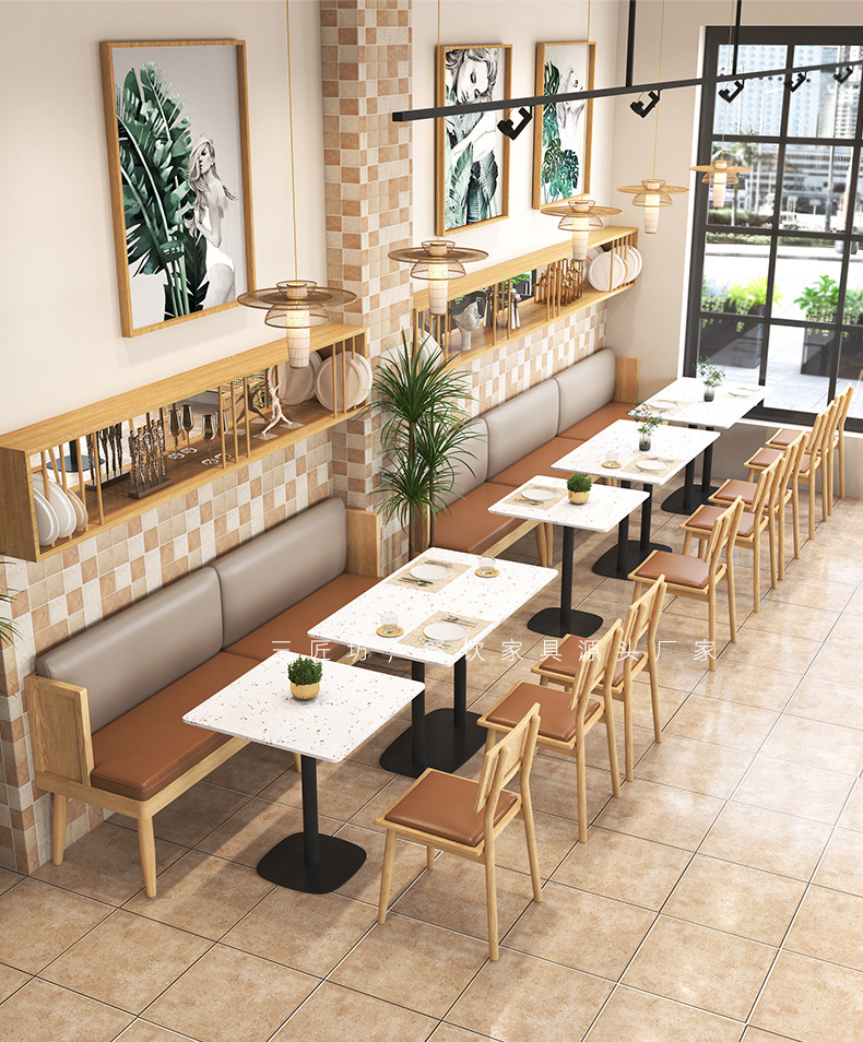 主题餐厅靠墙卡座沙发水磨石桌藤编椅商用饭店餐饮西餐厅桌椅组合