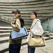韩版ins潮流单肩包外出旅游大容量旅行包休闲情侣手提包包批发