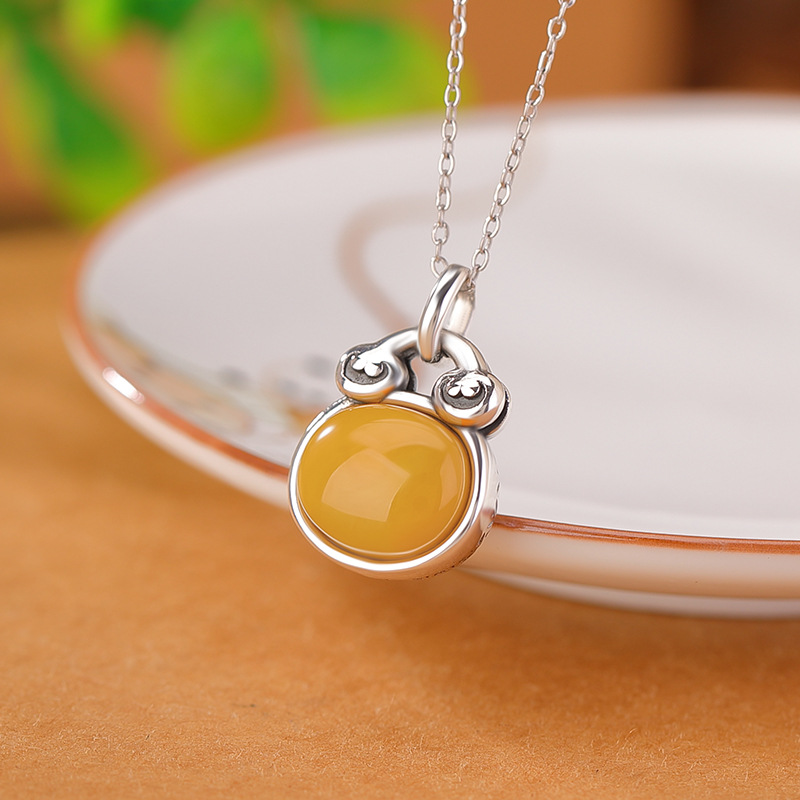 壹鹿银s999足银蜜蜡复古做旧钱币如意福袋蛋面吊坠国潮钱袋银挂坠