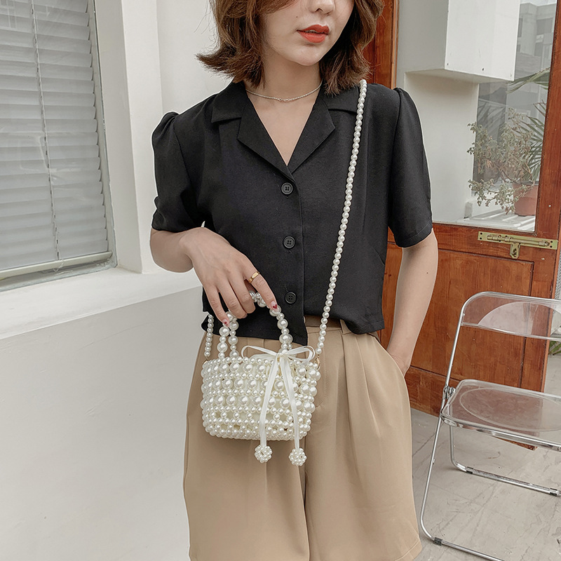 Summer Internet Celebrity Women's Bag New Simple Pearl Tote Texture Western Style Hollow Woven Bag Women's Bag