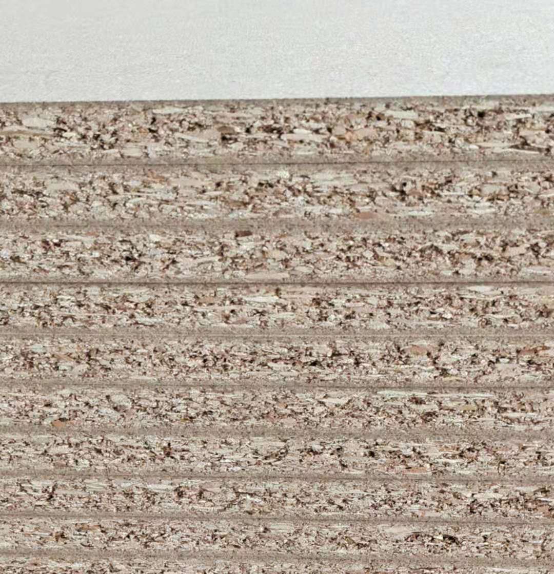 供应衣柜免漆板e0实木颗粒刨花板 橱柜电脑桌面板木板材定制加工