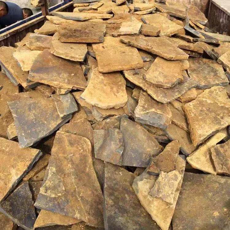 重庆批发当地虎皮石 黄色青色碎拼石材 地面公园不规则乱形景观石