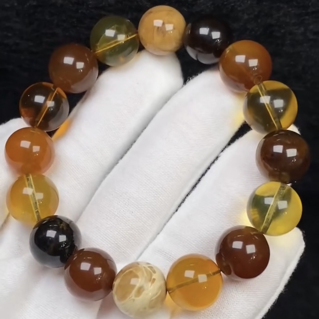 天然缅甸琥珀蜜蜡多宝手串 手链由根珀蓝珀金棕 棕红茶珀穿塔而成