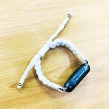 适用苹果iWatch新款手表编织小狮子手链潮牌男女黑白联合国厂表带
