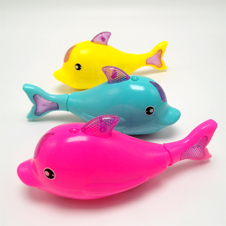 儿童玩具牵绳摇摆小海豚 灯光音乐电动七彩摇摆海豚 夜市地摊批发