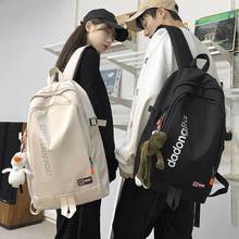日系情侣背包新款潮牌时尚旅行通勤背包大容量高颜值百搭双肩包