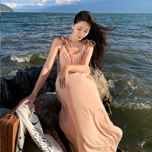 宽松简约度假风连衣裙橘色显白法式性感吊带低胸露背海边度假长裙