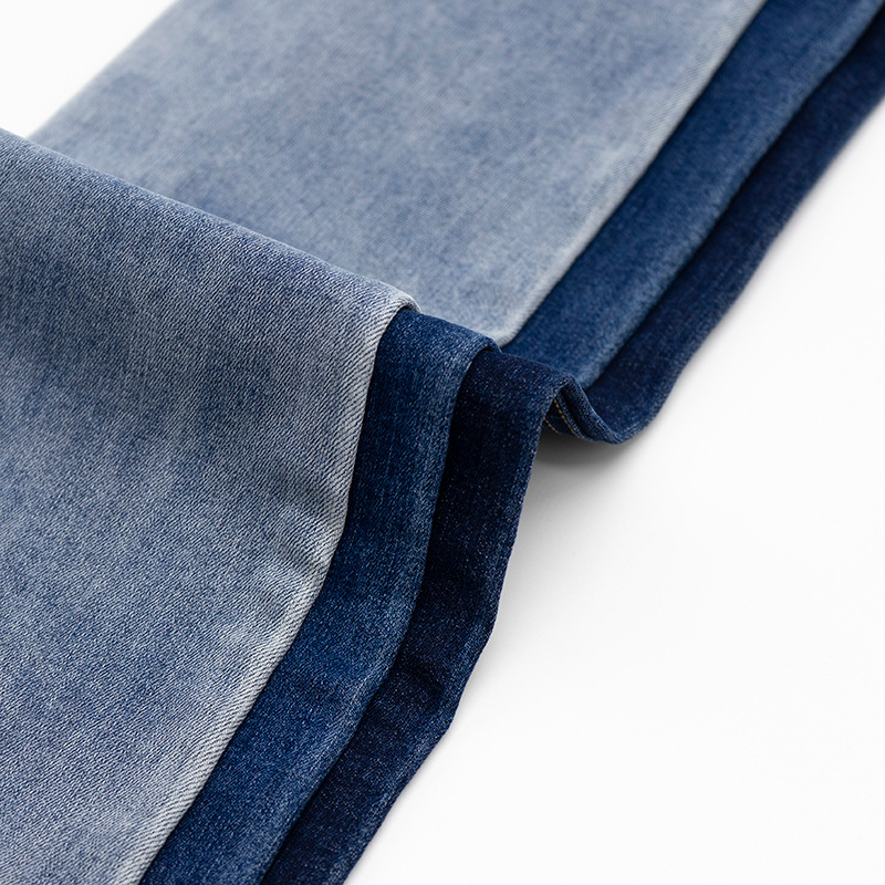 蓝色洗水牛仔布竹节棉涤弹力小脚裤喇叭裤面料水洗新疆棉丹宁布料