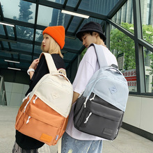 批发新款潮韩版撞色时尚大容量双肩包女高中大学生书包男旅行背包
