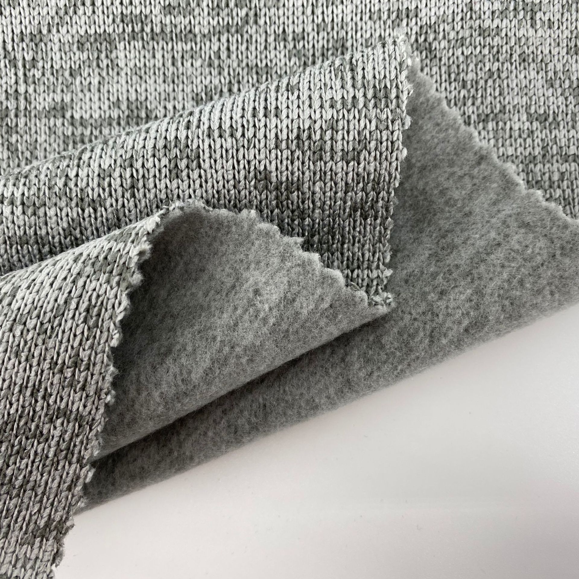 批发全涤粗针拉毛布 反面针织磨毛家居服打底裤运动服面料抓毛布