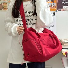 日系ins潮牌单肩包百搭运动风女学生上课通勤背包大容量斜挎包男