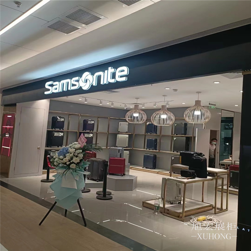 商务男士包包专柜展示柜定制 设计服装化妆品柜 烤漆钱包皮具货柜