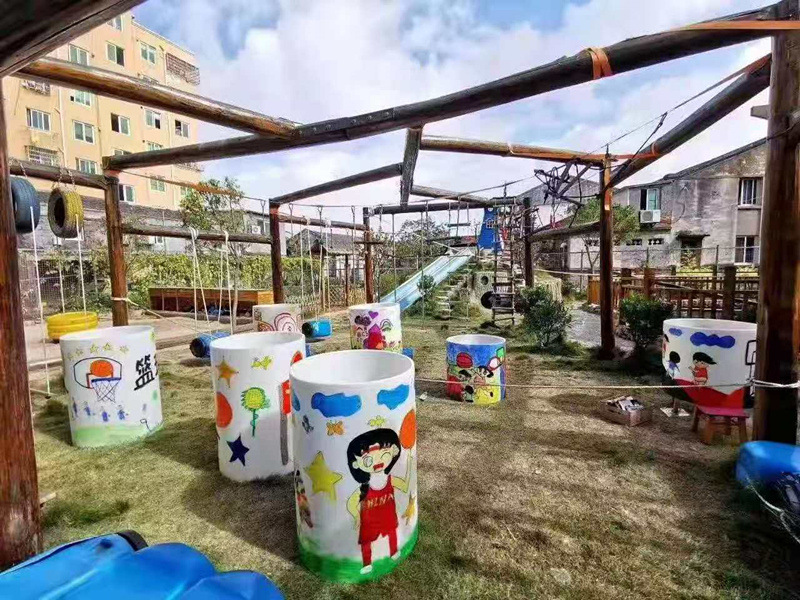 幼儿园安吉滚筒游戏室外互动感统训练器材钻洞pvc脚踩平衡大玩具