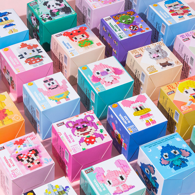 鑫哲拼塔彩盒包装批发串联小颗粒积木益智拼装玩具男女孩礼物地摊