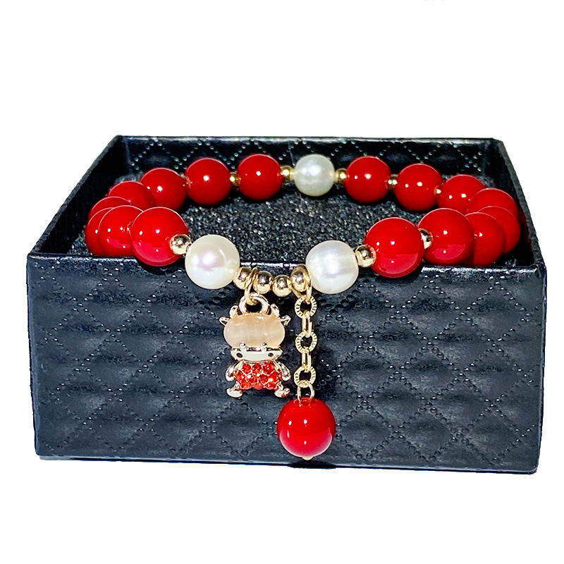 民族风女本年命动物猫眼石小牛珍珠串珠流苏手链女饰品批发-阿里巴巴