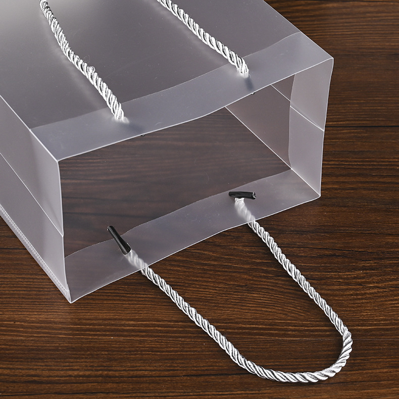 现货pp透明磨砂手提袋塑料服装pvc购物袋空白手提塑料袋加印logo