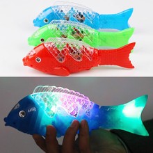 儿童玩具创意发光电动音乐鱼摇摆鱼投影鱼仿真鱼公园地摊广场货源